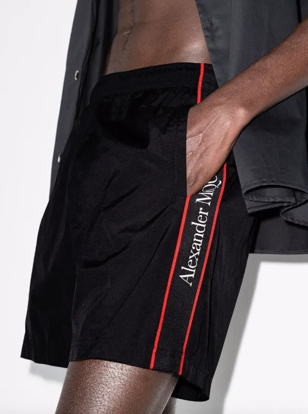 Alexander McQueen selvedge logo-jacquard swim shorts